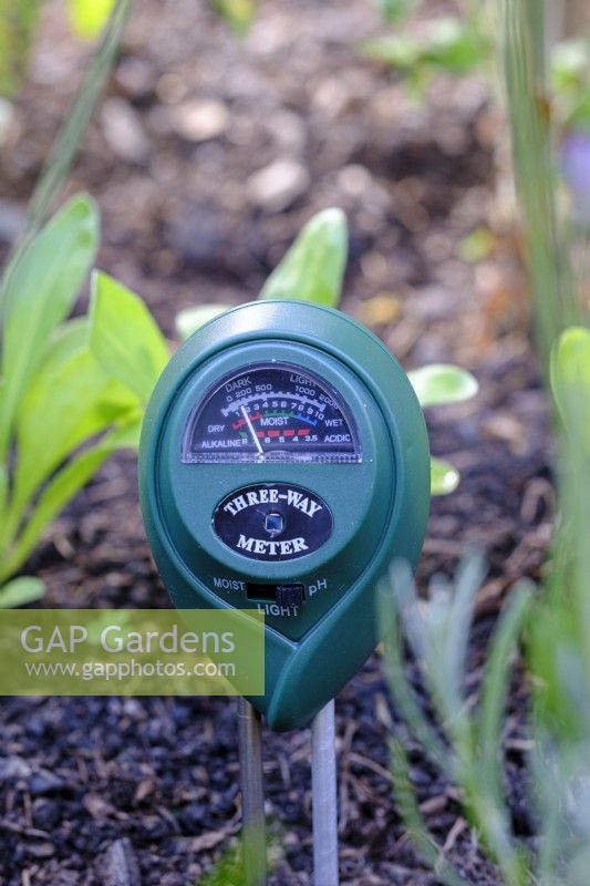 Soil meter that measures measuring moisture, pH and light.