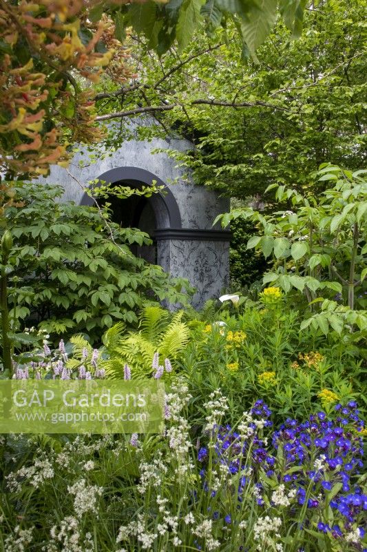 View past planting to temple on the- Myeloma UK - A Life Worth Living Garden - designer Chris Beardshaw - RHS Chelsea Flower Show 2023