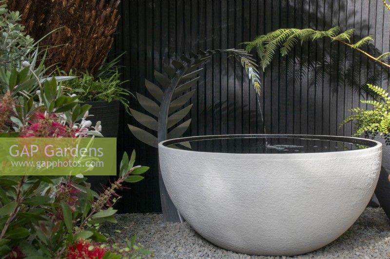 Cyathea dealbata - silver fern - inspired contemporary water feature on the Feels Like Home garden designed by Rosemary Coldstream - About the Garden - RHS Chelsea Flower Show 2023