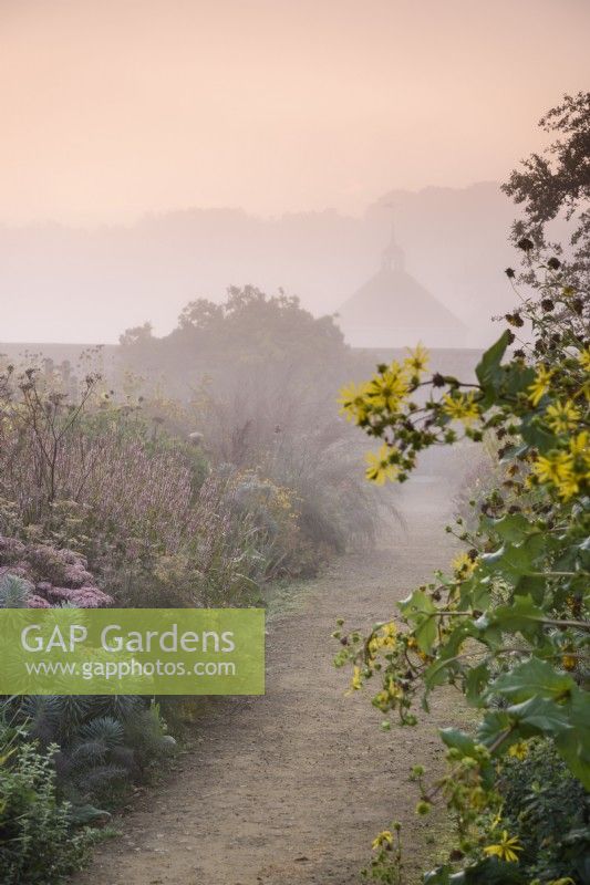 Misty morning in the walled garden at Parham House in September