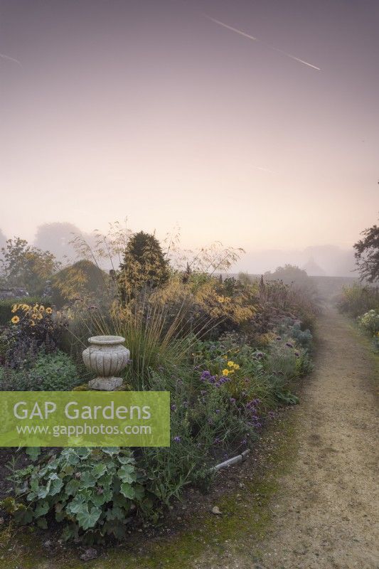 Misty morning in the walled garden at Parham House in September