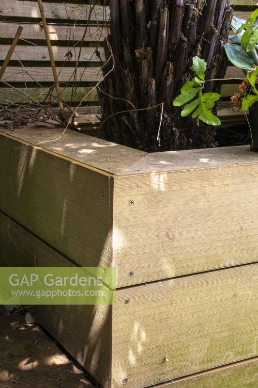 A wooden raised bed.