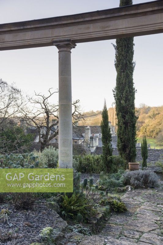 View through the colonnade towards the far side of the valley at Iford Manor in January