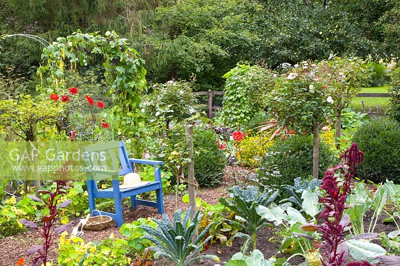 Comfortable seating area in the vegetable garden 