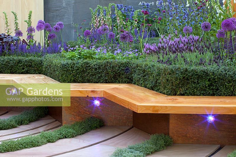 Raised bed with integrated bench and lighting 