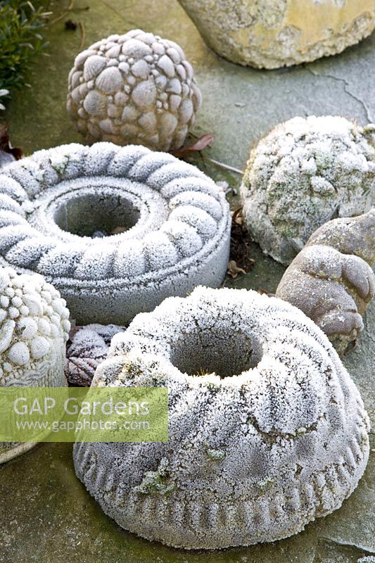 Concrete cake molds in frost 