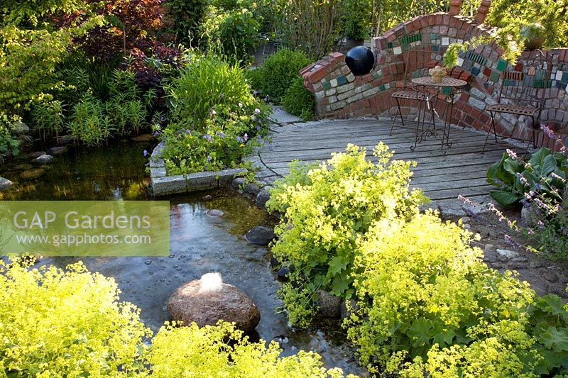 Pond with bubbler and seating area 