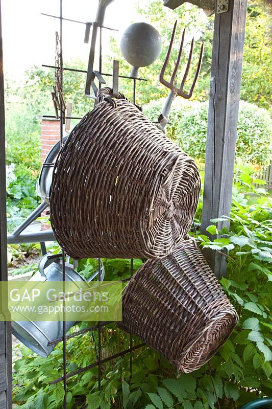 Old garden tools and baskets for decoration 