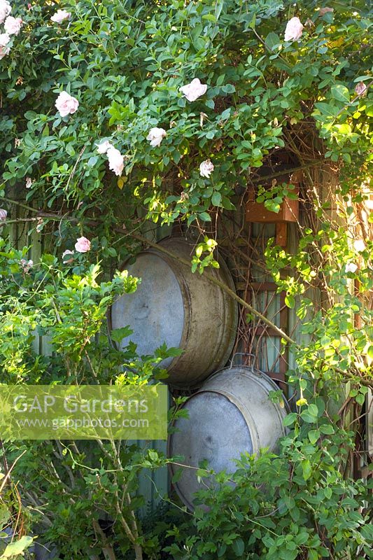 Old zinc tubs on the garden house 