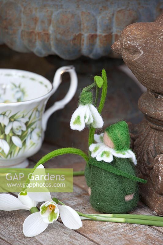Small felt doll with snowdrops, Galanthus 