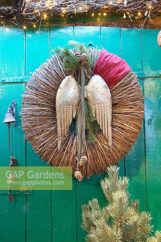 Christmas decoration, wreath with angel wings made of metal 
