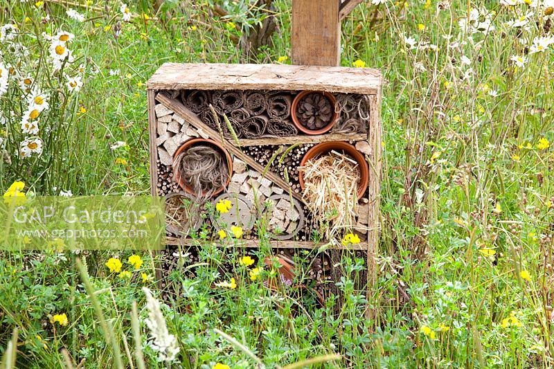 Insect hotel in the natural garden 