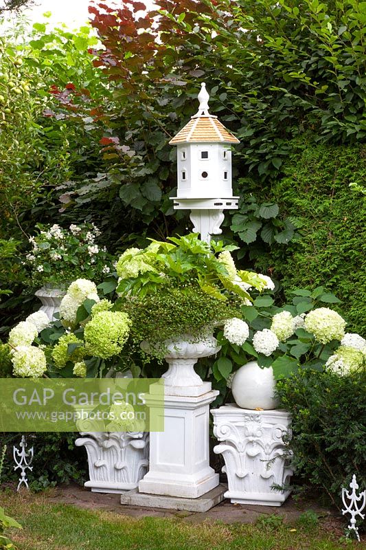 Vintage garden decoration with dovecote 