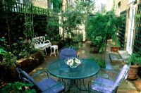 Urban courtyard garden with furniture