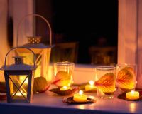 Window display with candles and lanterns