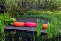 Patio with colourful cushions in the Merrill Lynch Garden at Chelsea FS 2004