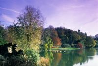 The Lake and ruins in autumn at Stourhead in Wiltshire. 