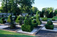 Yew topiary chess set from Taxus baccata at Brickwall House, Sussex.  