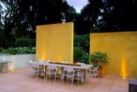 Dining furniture on patio in modern garden in Palo Alto, USA