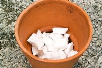 Planting pot sequence, terracotta pot filled with polystyrene to save on compost and make the pot lighter to move