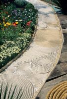 Path using rope laid out in circular patterns.