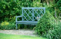 Painted wooden bench in a garden