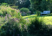 Sloping garden. Cobblers, Sussex