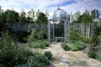 Romantic silver patio garden with gazebo, trellis