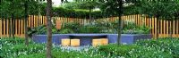 Contemporary slate stonework and fencing in 'Cancer Research UK/Atrixo Outlook Garden' - RHS Chelsea 2003


