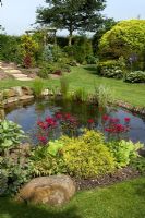 Well planted garden pond at Cypress House in Dalton