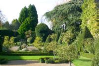Clipped Yew hedging and topiary at The Abbey House, Malmesbury, Wiltshire