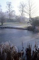 The frozen Horse Pond at Great Dixter in winter