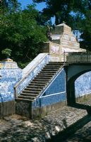 Tile canal and steps in the Jamor stream, Palace of Queluz, near Lisbon, Portugal in May