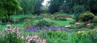 The Dell Garden, Bressingham - View of the garden with island beds and borders of mixed herbaceous perennials