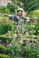 The potager with scarecrow - Barnsley House Gardens, Gloucestershire
