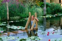 Girl in the swimming pond, designed by Daniel Lloyd-morgan for Capel Manor - Hampton Court 2001