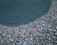 Cobbles and raked gravel in The Water Gardens - London - 'The Swimmer', a Japanese inspired landscape by Tony Heywood