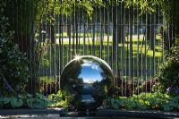 Stainless steel sphere in the Growing Together garden at Hampton Court FS 2007. 