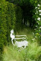 White wooden bench in 'The Daily Telegraph Garden' - Chelsea FS 2007 