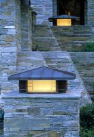 Contemporary conceptual dry stone wall with built in light - The Summerlin Garden, Las Vegas, USA