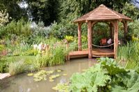 Wooden shelter beside pond - 'Summertime' World of Water Garden, Hampton Court 2007