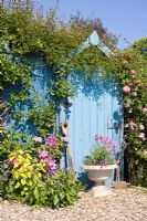 Cottage garden with blue painted door