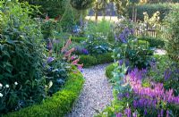 Cottage style garden with gravel path