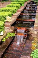 A shallow waterfall made of bricks