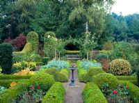 Formal garden with clipped Buxus hedges