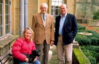 Lord Digby in the centre, with his son and daughter-in-law, The Hon Mr and Mrs Henry Digby, with Barney the Jack Russell terrier. Minterne House, Minterne Magna, Dorset.