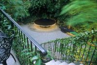 Contemporary garden with raised central circular water feature - The Che garden California USA