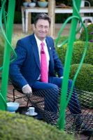 Alan Titchmarsh at the Chelsea Flower Show 2008. Sitting at The Oceanico Garden by Diarmuid Gavin Designs.