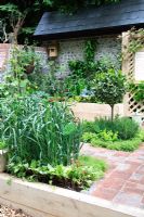 Mixed flowers and vegetables, Garden - The Dorset Cereals Edible Playground, Design - Nick Williams-Ellis, Sponsor - Dorset Cereals - Best Courtyard Garden, Gold Medal Winners