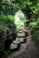 Stepping stones in the stream at the entrance to the Fern Grotto - Dewstow Hidden Gardens and Grottos